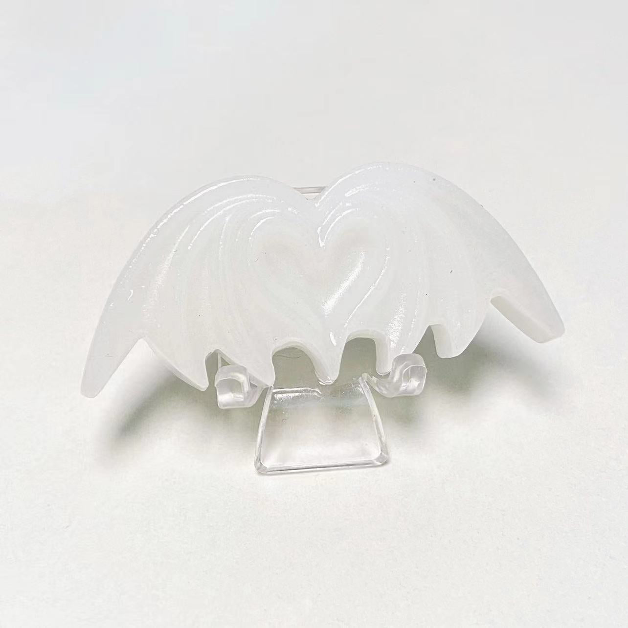 Crystal heart bat carvings