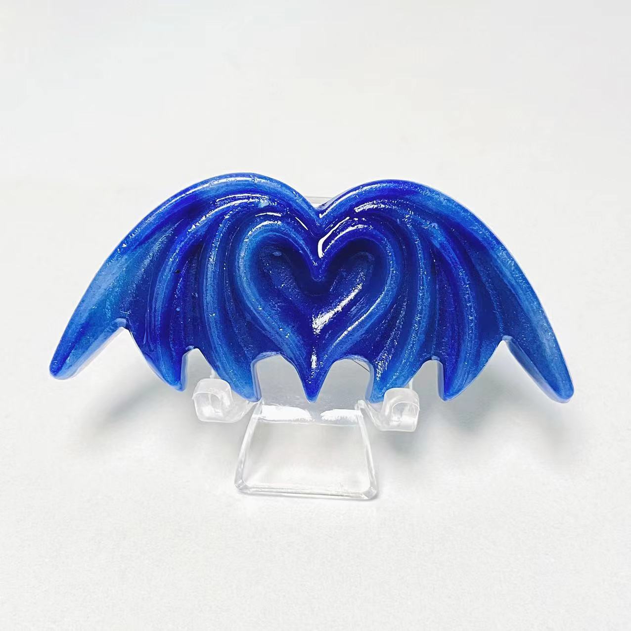Crystal heart bat carvings