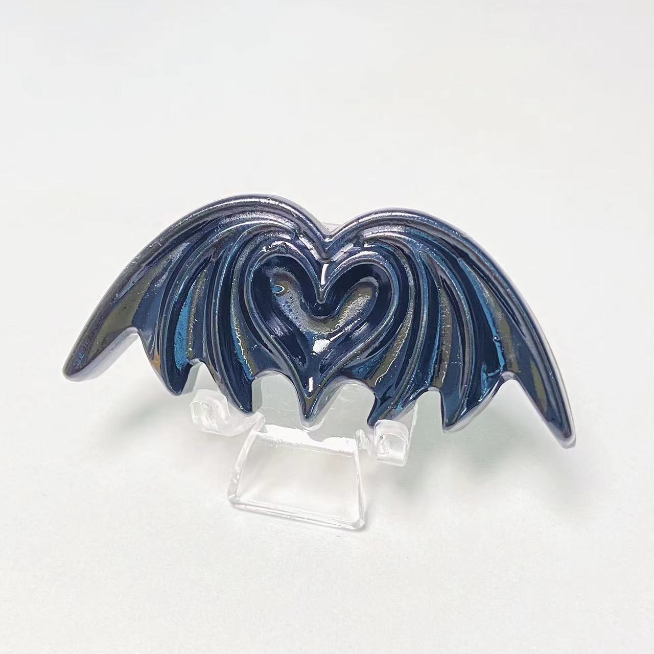 Crystal heart bat carvings