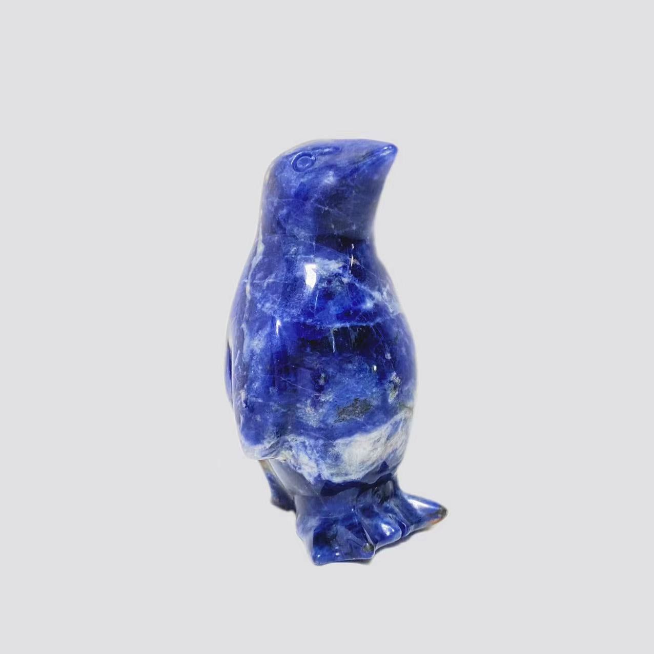 Crystal penguin carvings