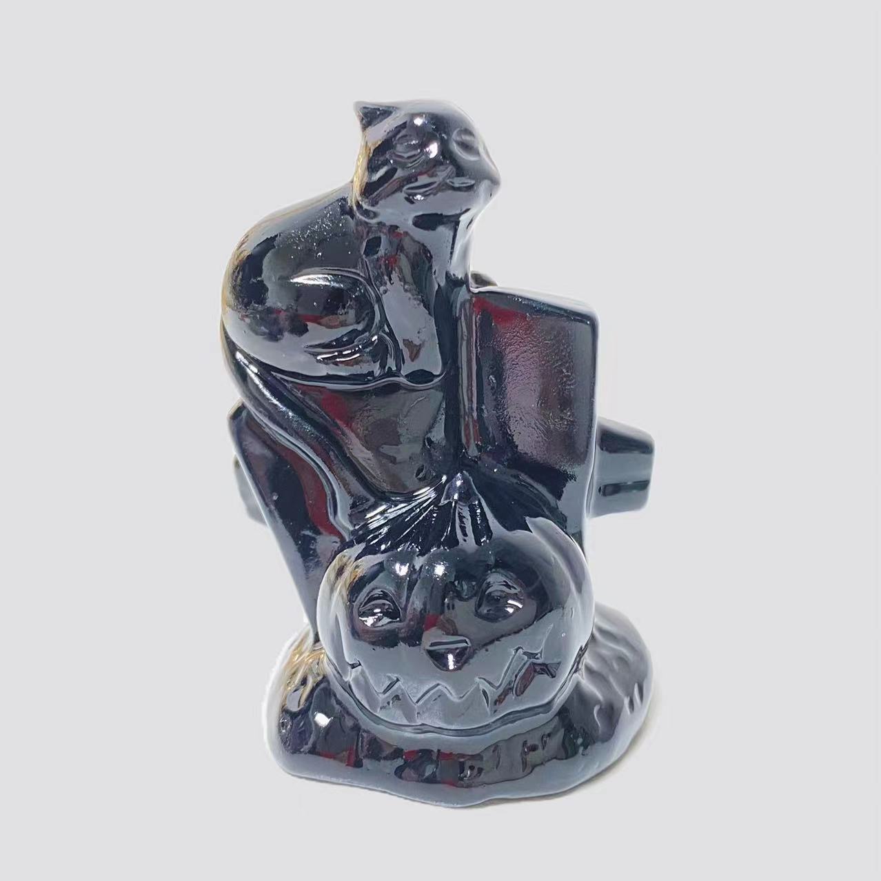 Cat with pumpkin carving