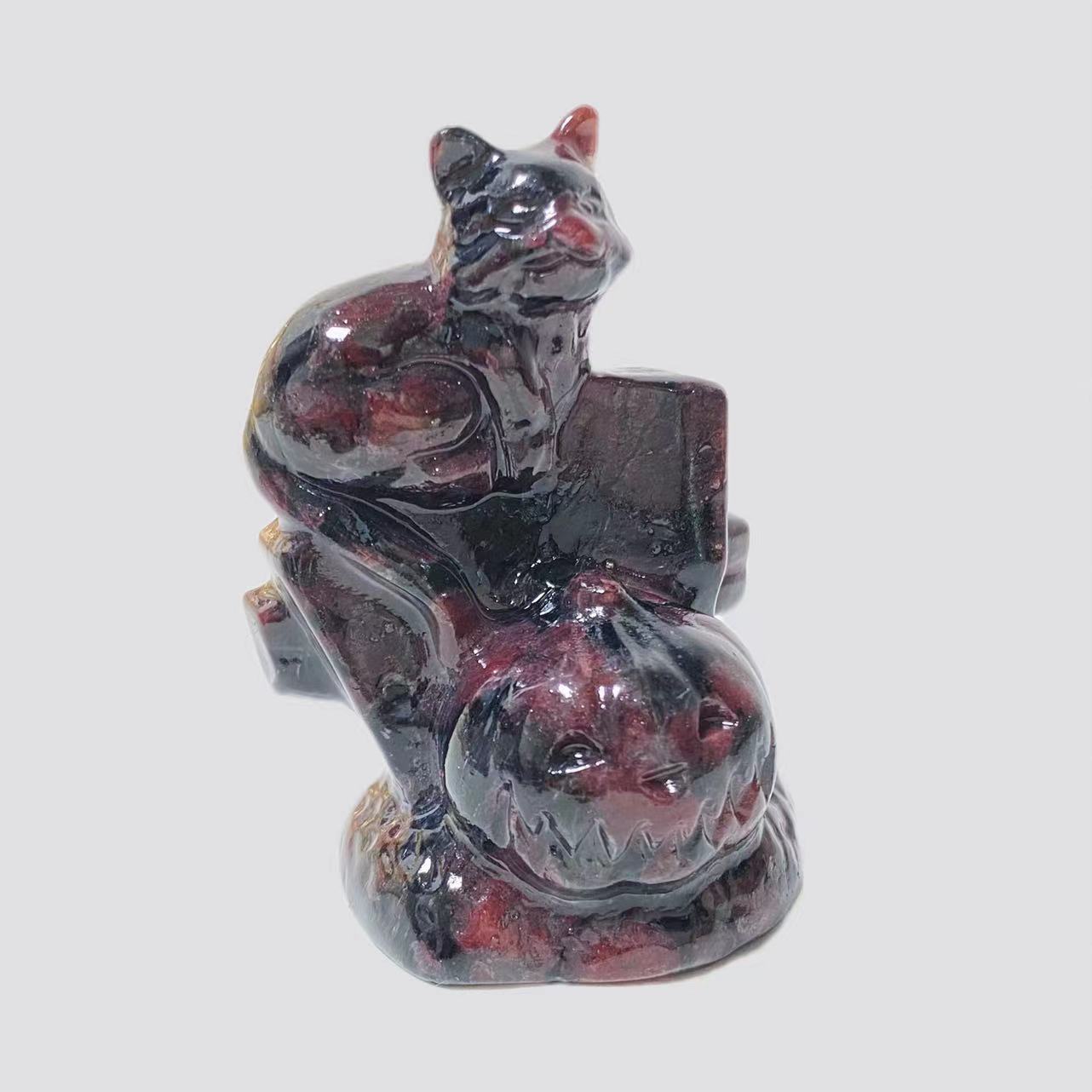 Cat with pumpkin carving