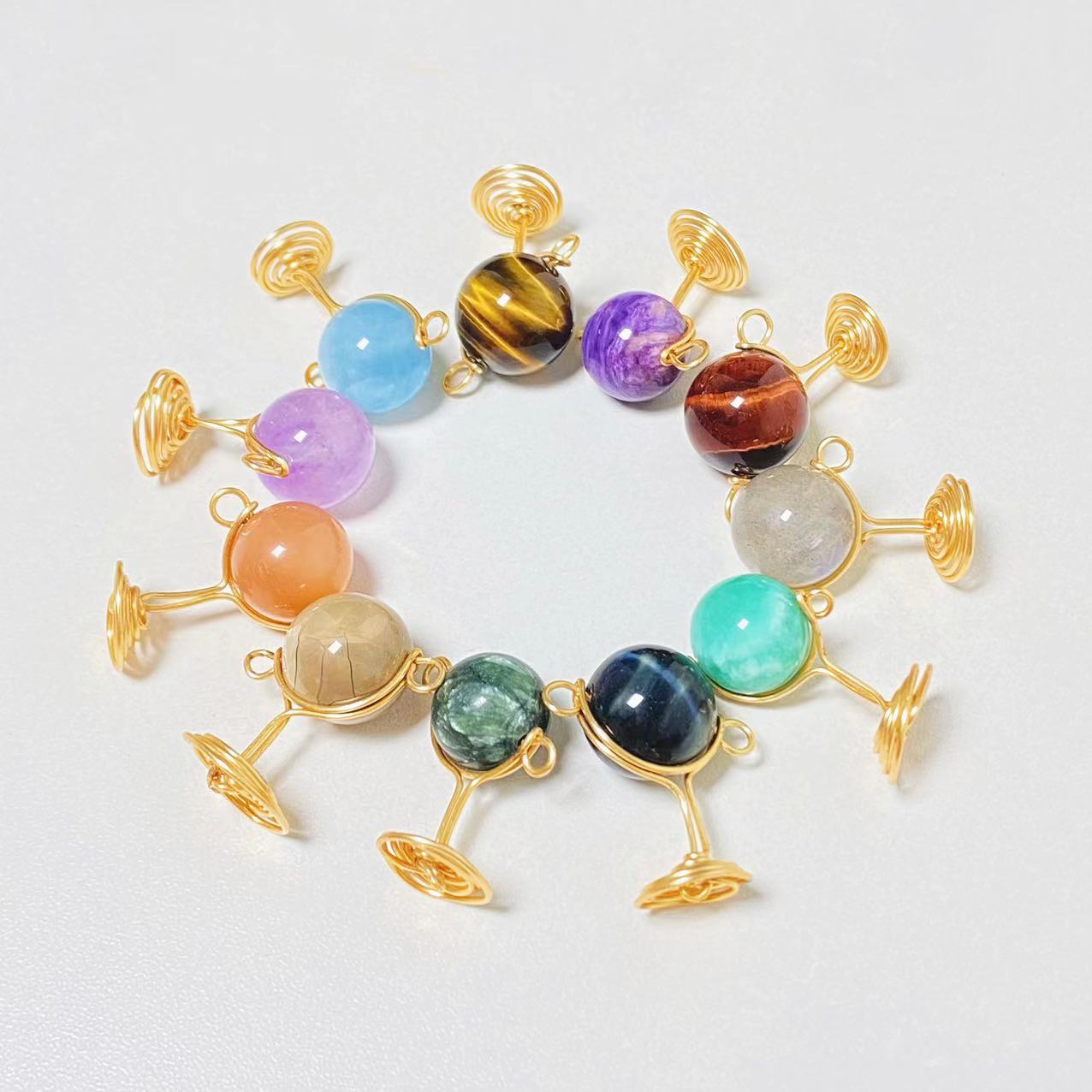 Different materials planet pendants