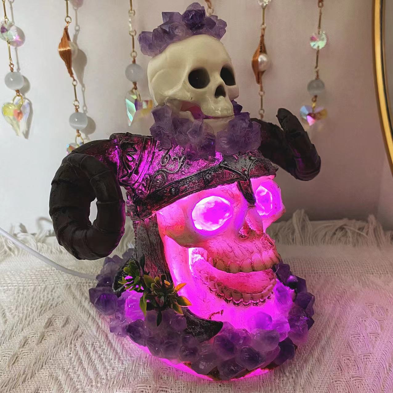 Double skulls with amethyst clusters flower light