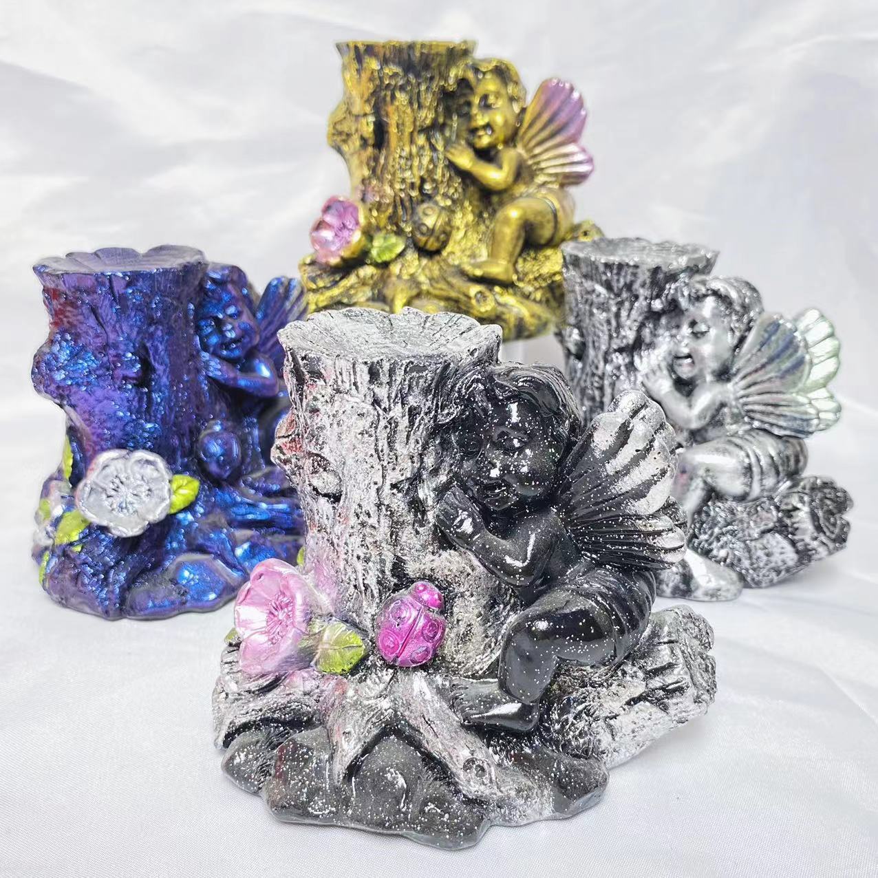 Resin angel with tree sphere stand