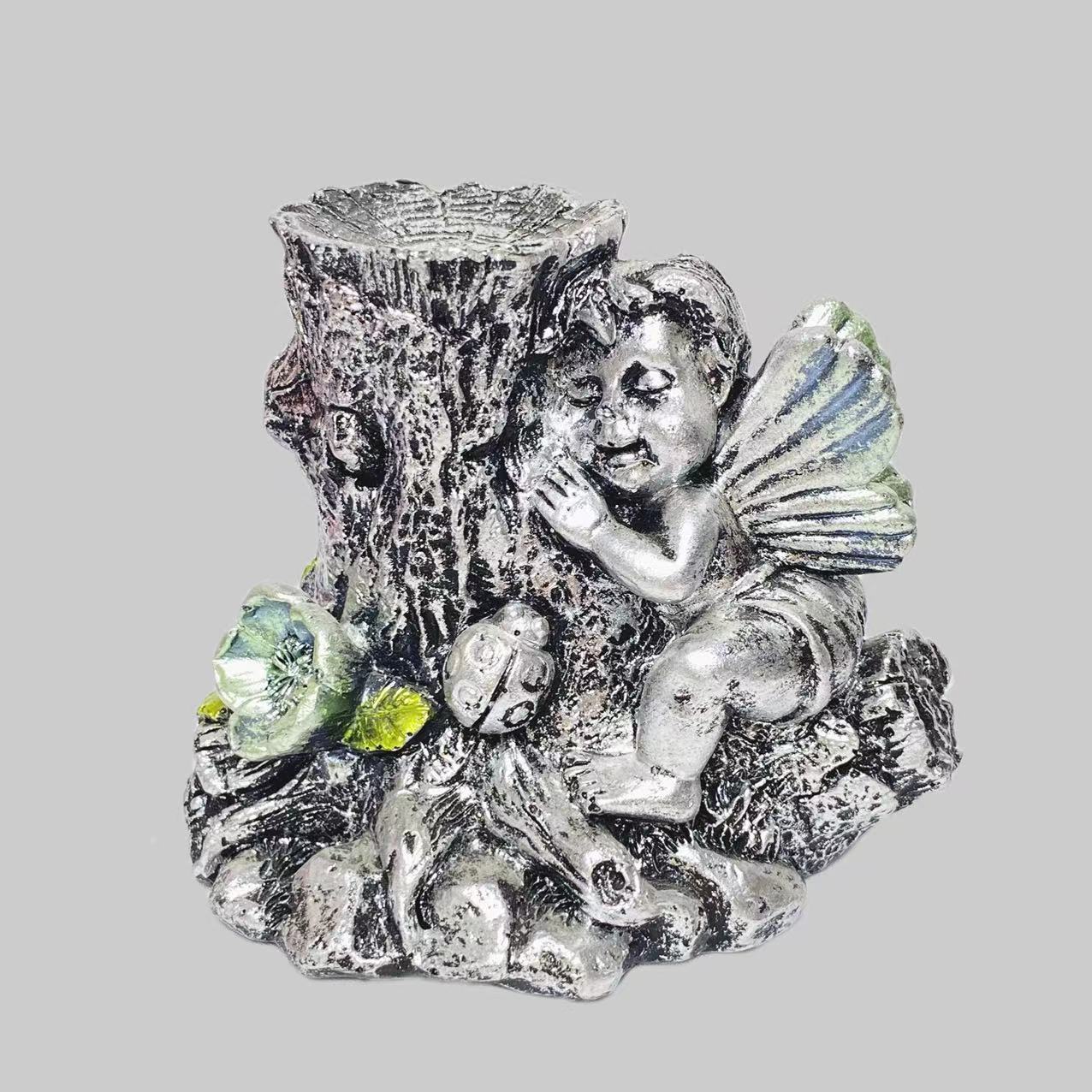 Resin angel with tree sphere stand