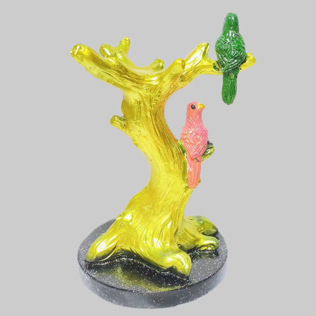 Resin birds on tee sphere stand