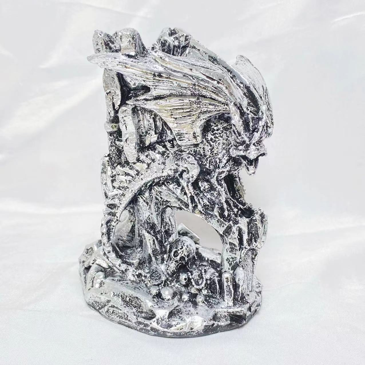 Resin flying dragon on castle sphere stand