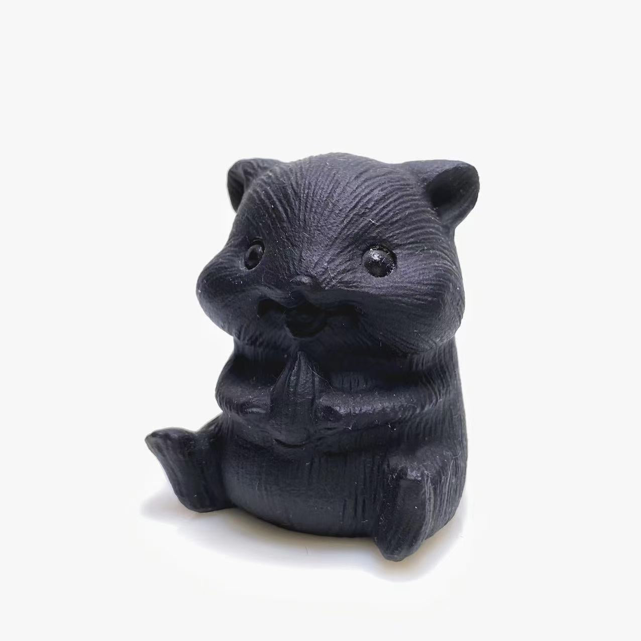 Black obsidian hamster carving