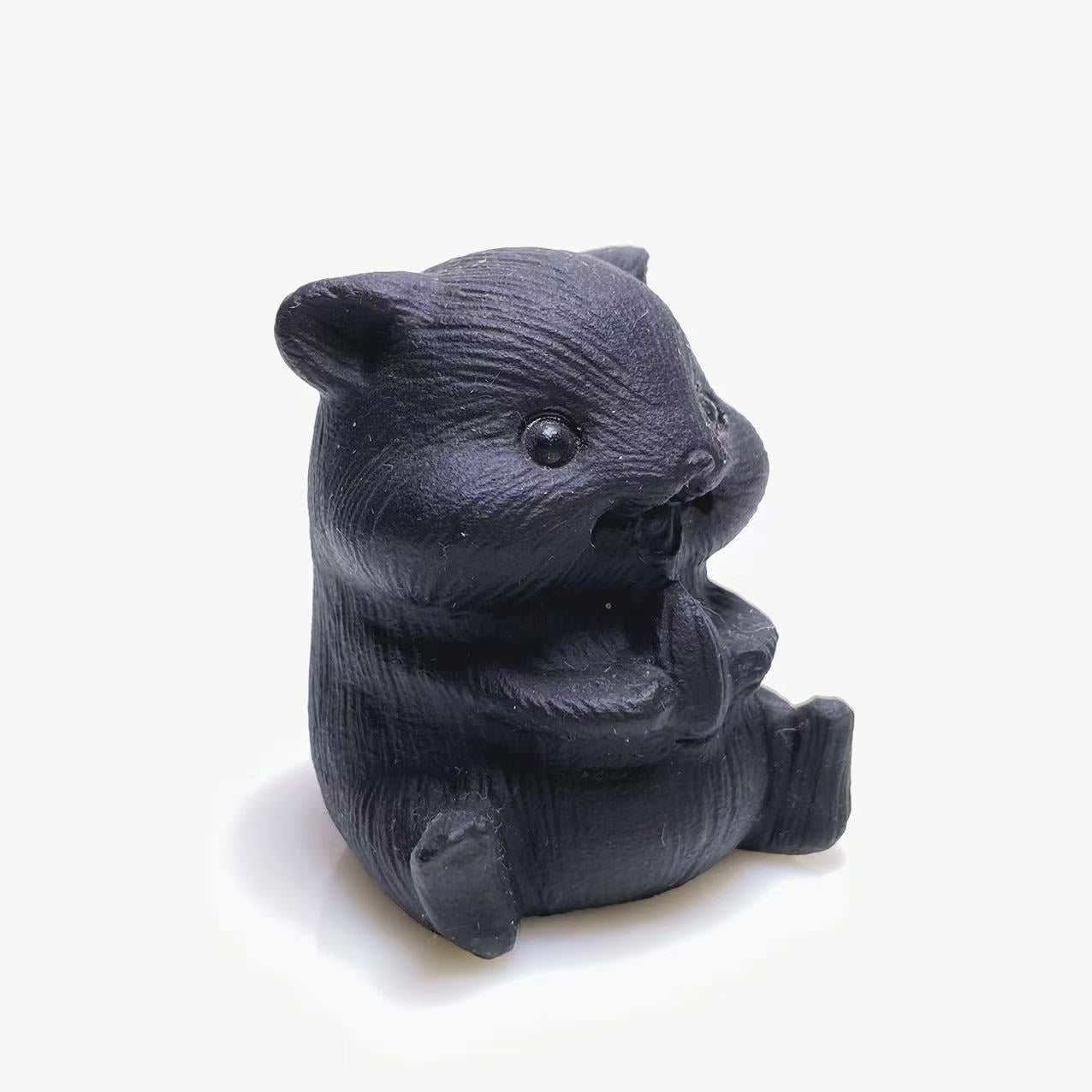 Black obsidian hamster carving