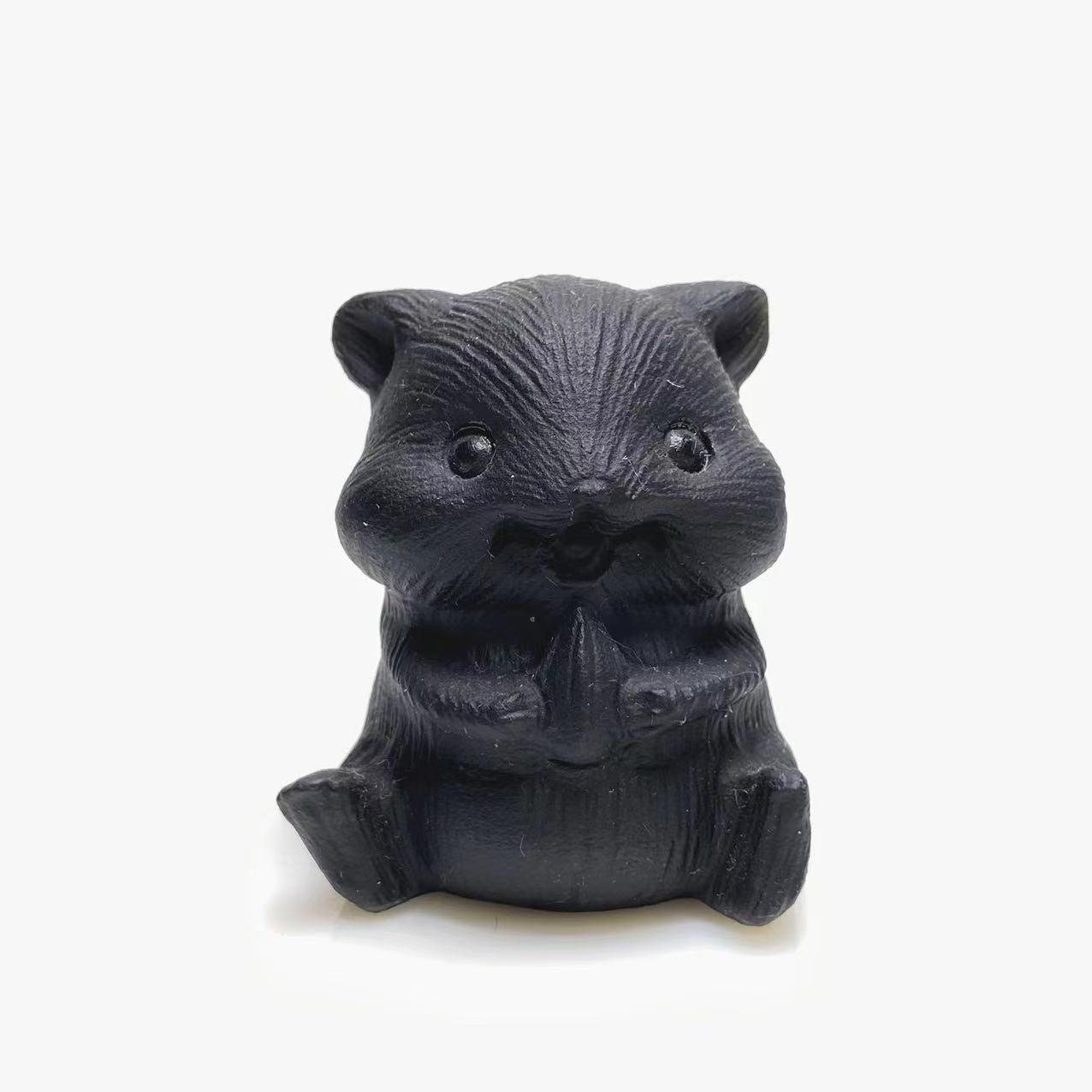 Black obsidian hamster carving