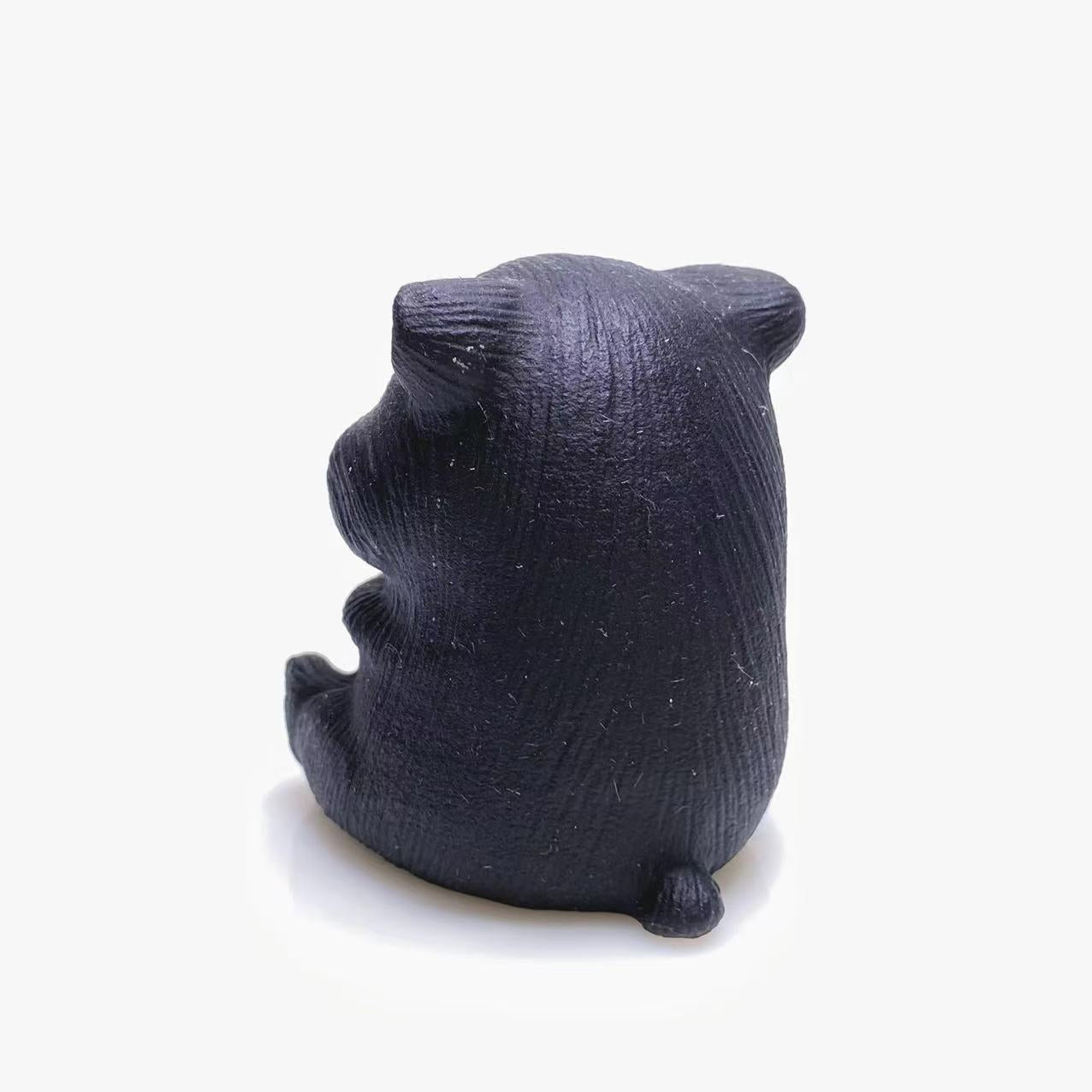 Black obsidian hamster carving