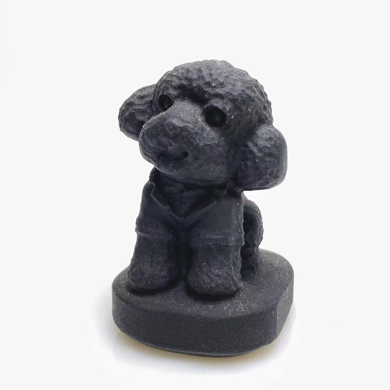 Black obsidian Teddy dog carving