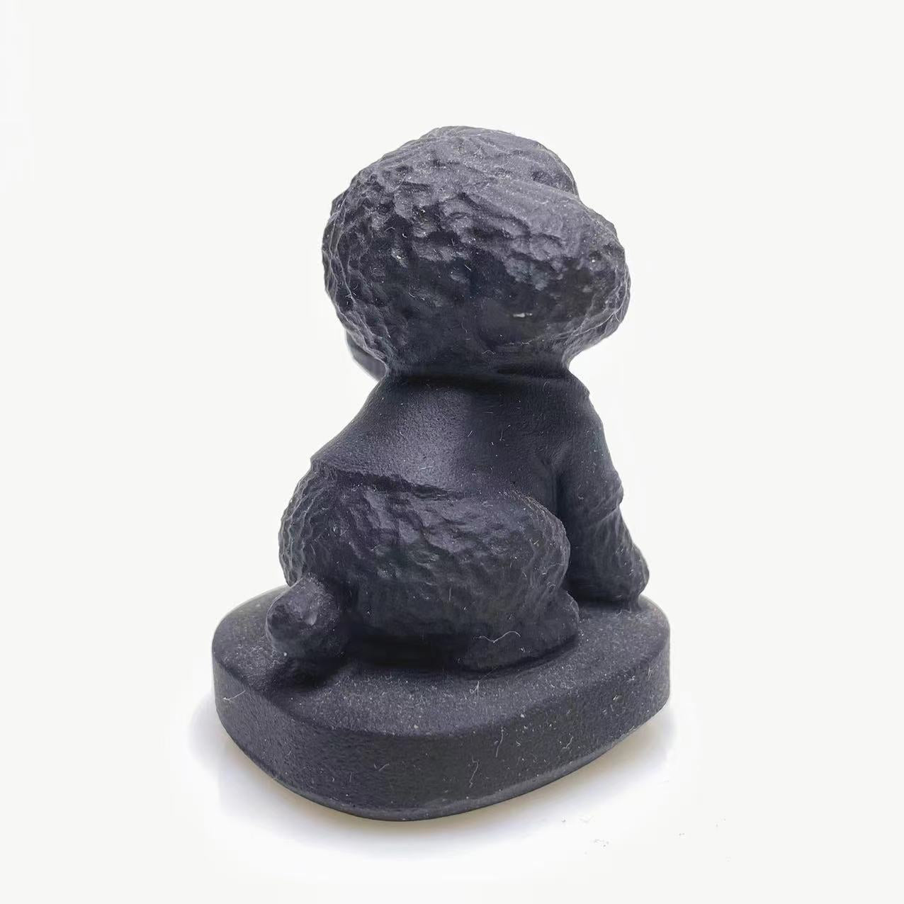 Black obsidian Teddy dog carving