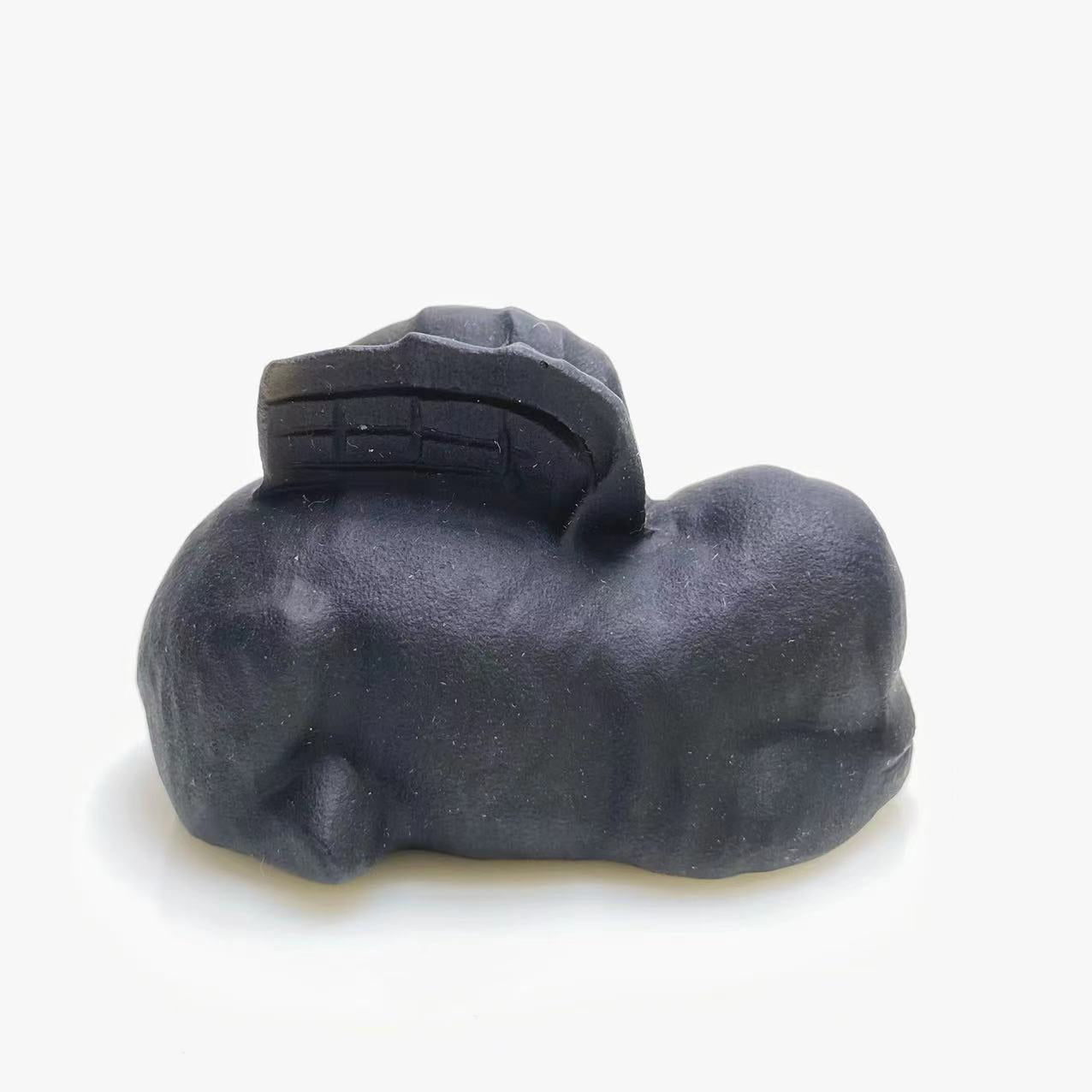 Black obsidian angel dog carving