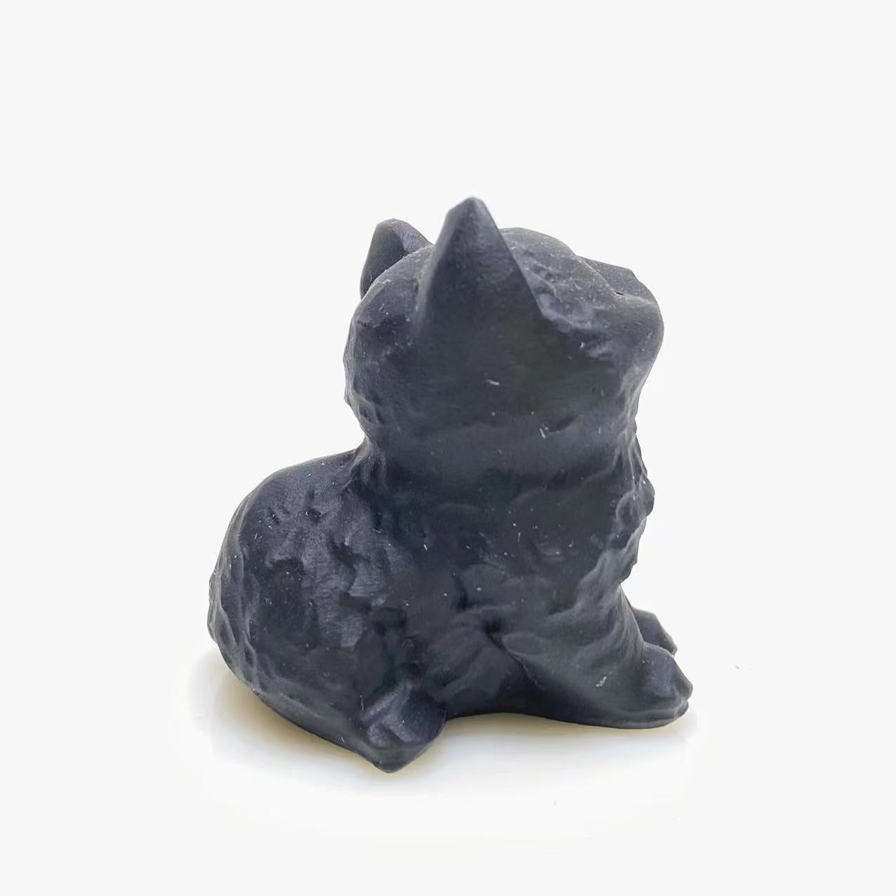 Black obsidian cat carving