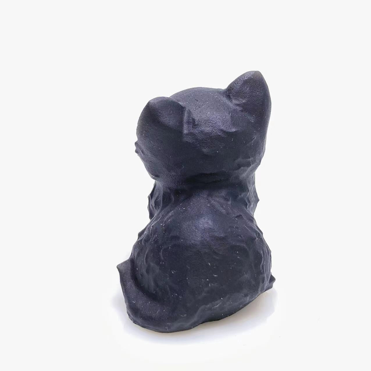 Black obsidian cat carving