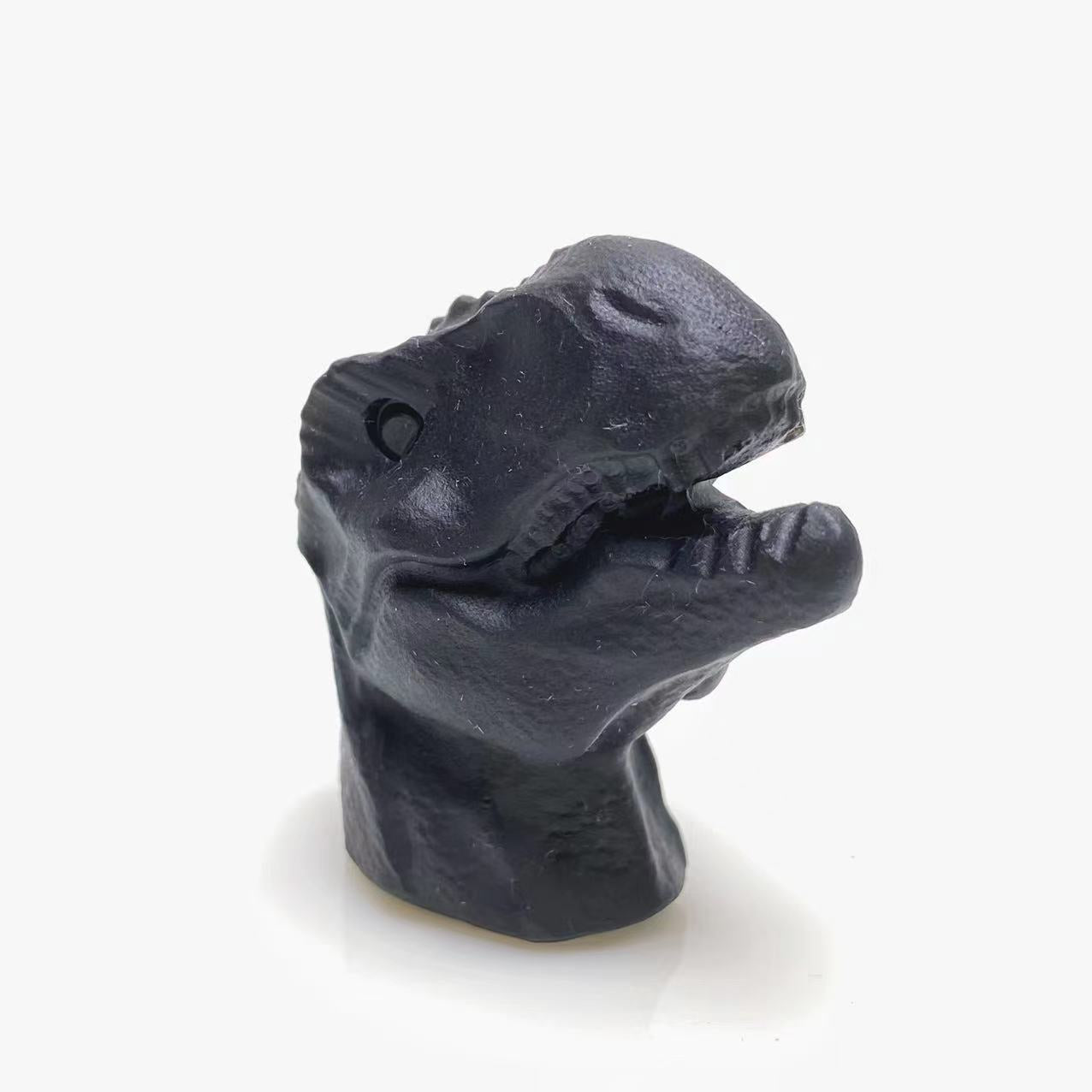 Black obsidian dinosaur head carving