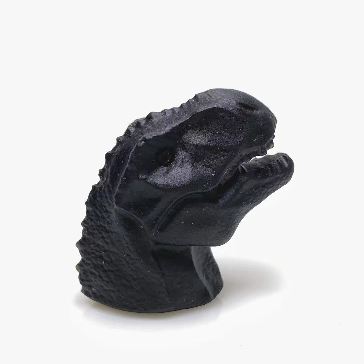 Black obsidian dinosaur head carving