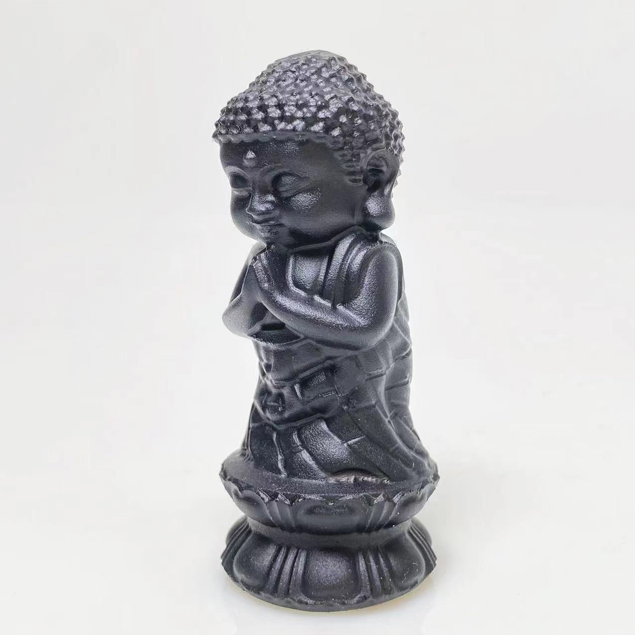 Black obsidian buddha on lotus carving