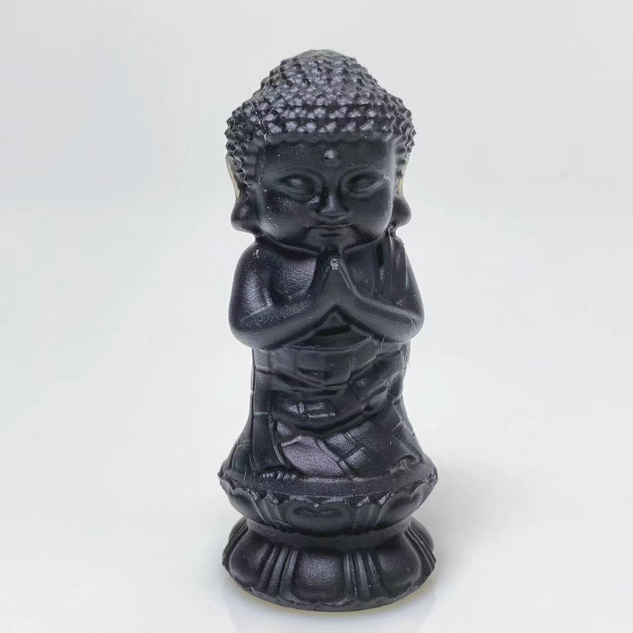 Black obsidian buddha on lotus carving