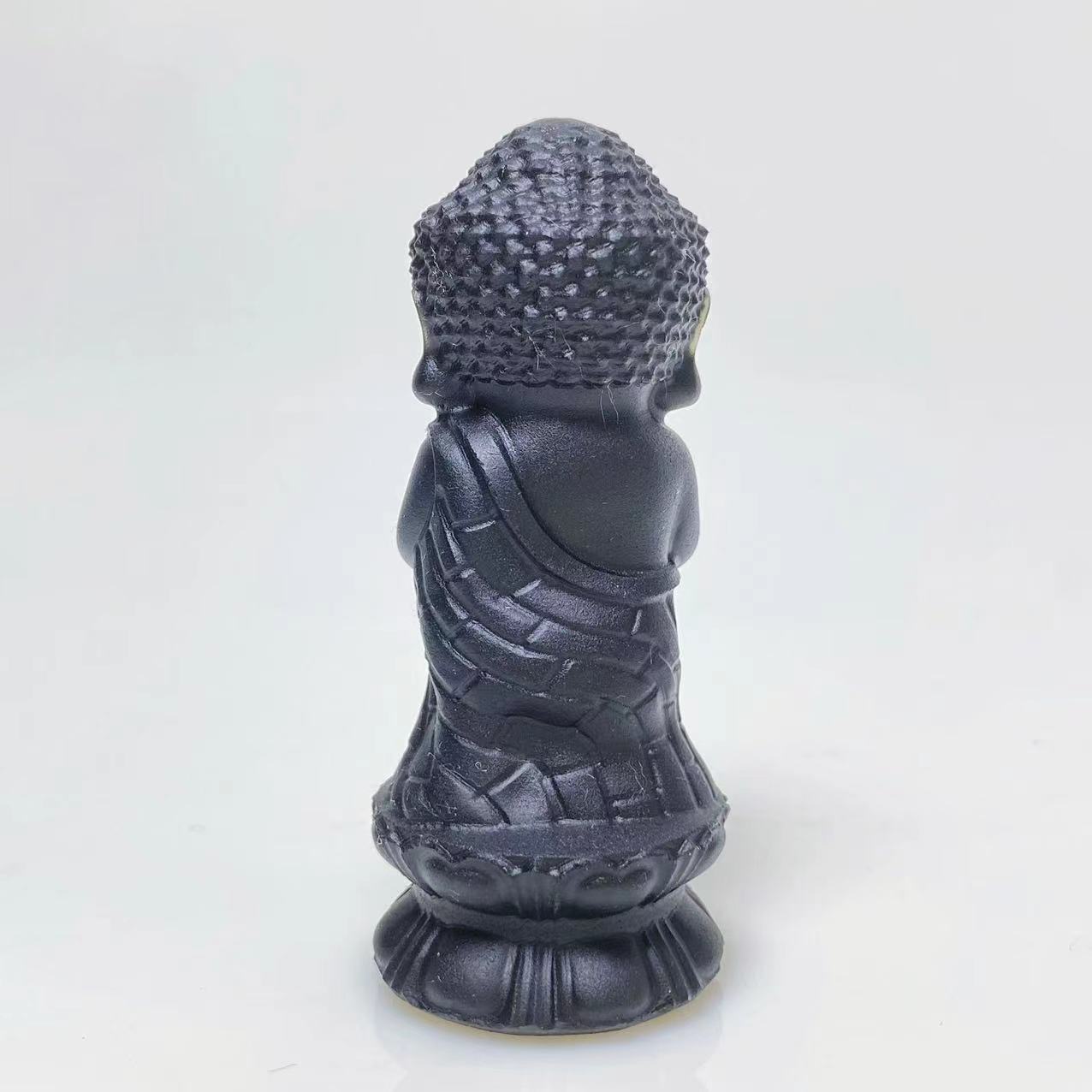 Black obsidian buddha on lotus carving