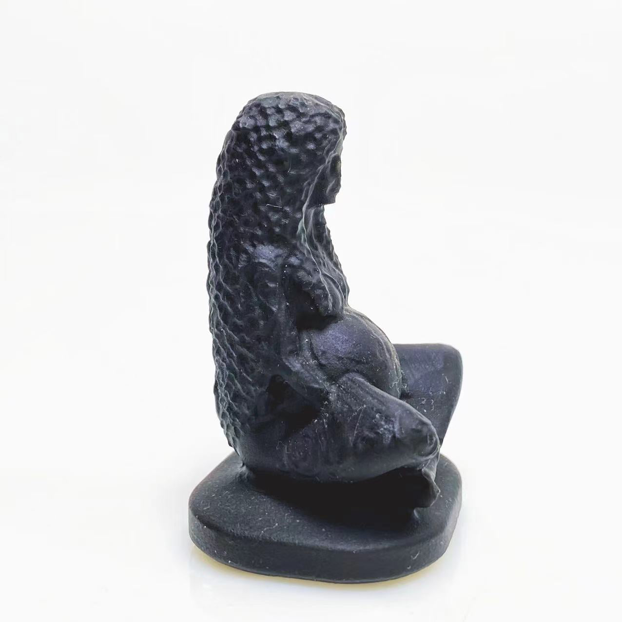 Black obsidian mother earth carving
