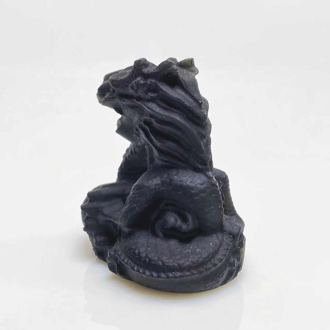 Black obsidian Chinese Dragon carving