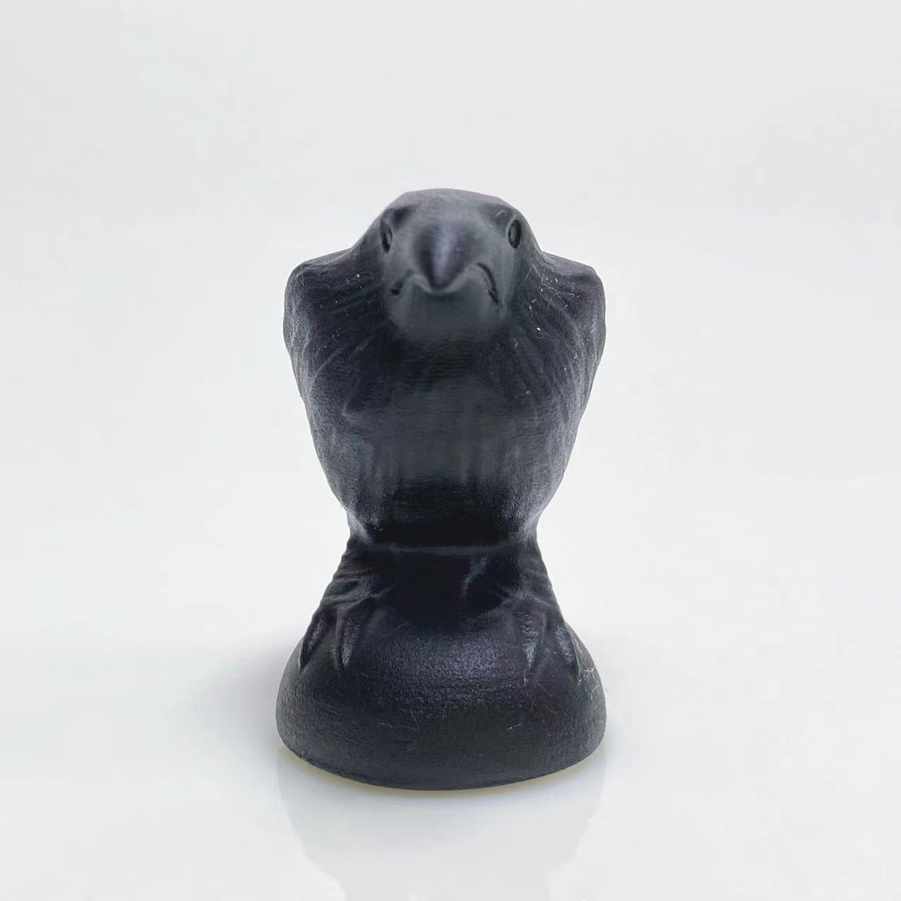 Black obsidian raven carving