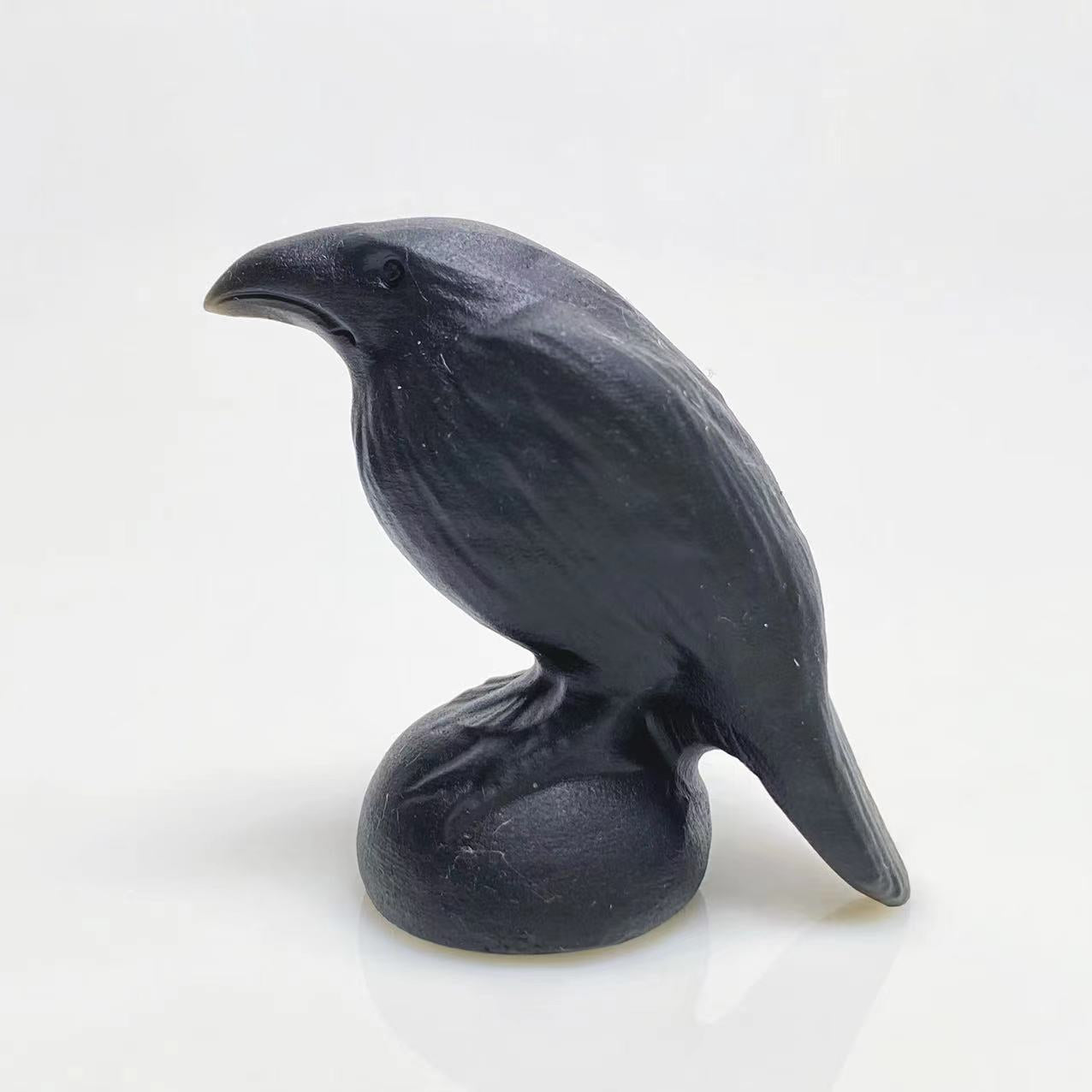 Black obsidian raven carving
