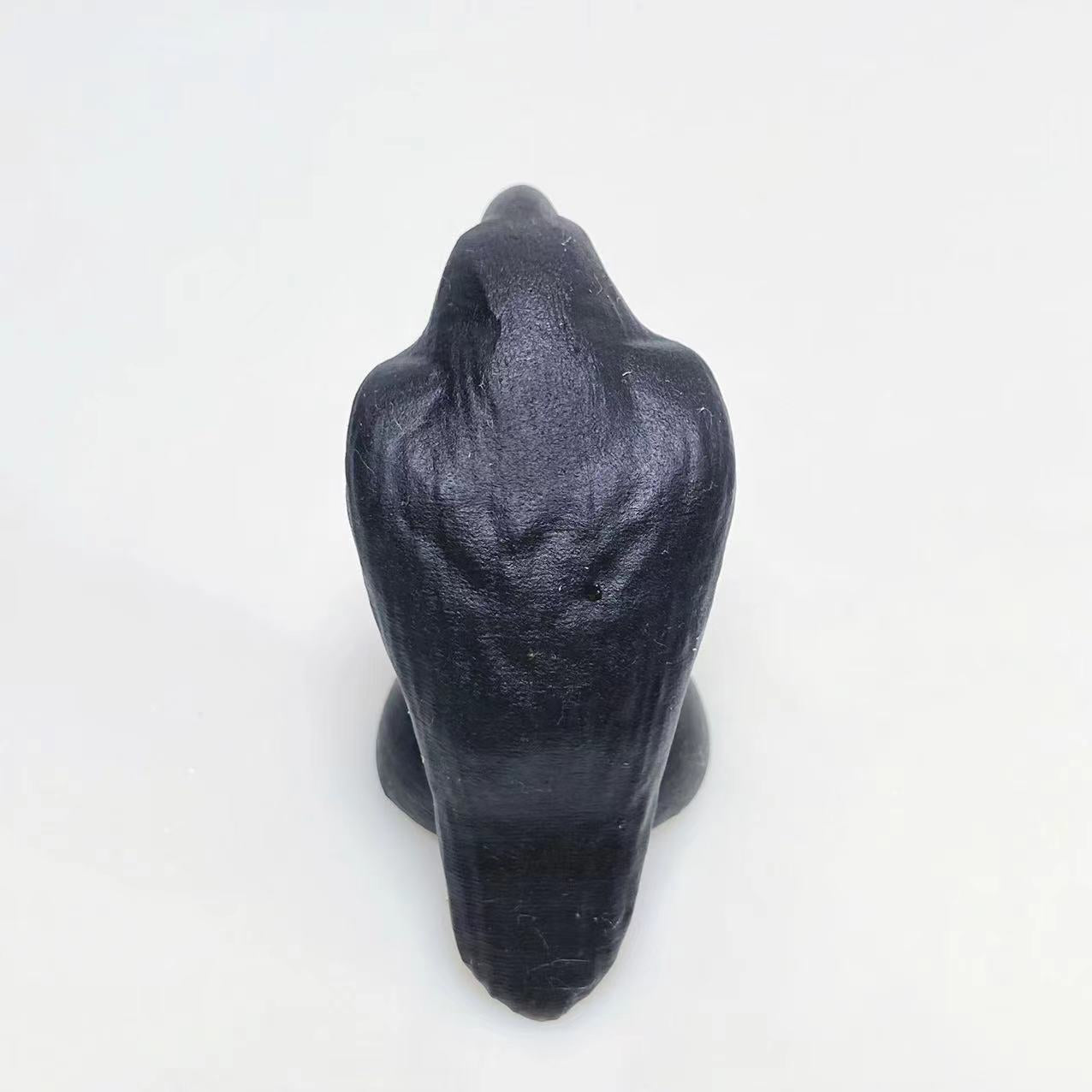 Black obsidian raven carving