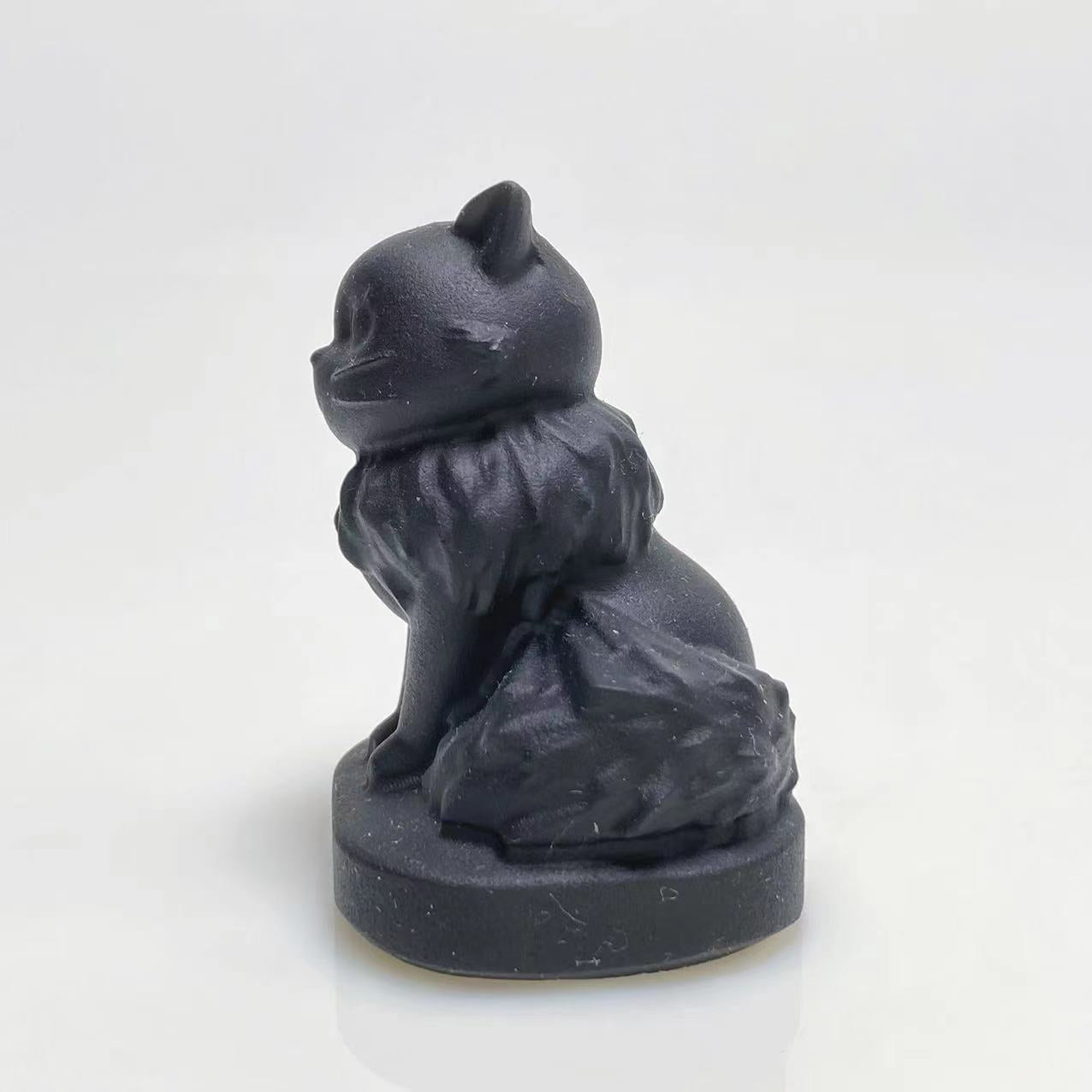 Black obsidian elegant cat carving