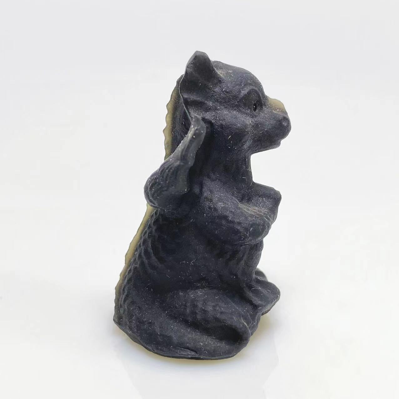 Black obsidian flying dragon baby carving