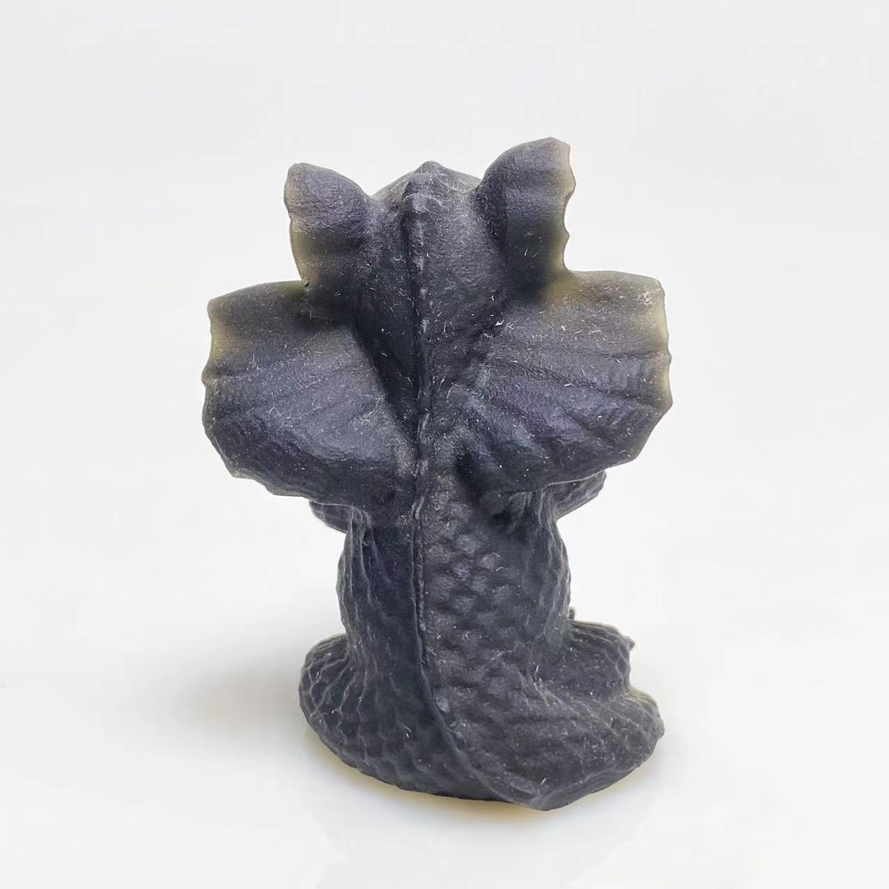 Black obsidian flying dragon baby carving