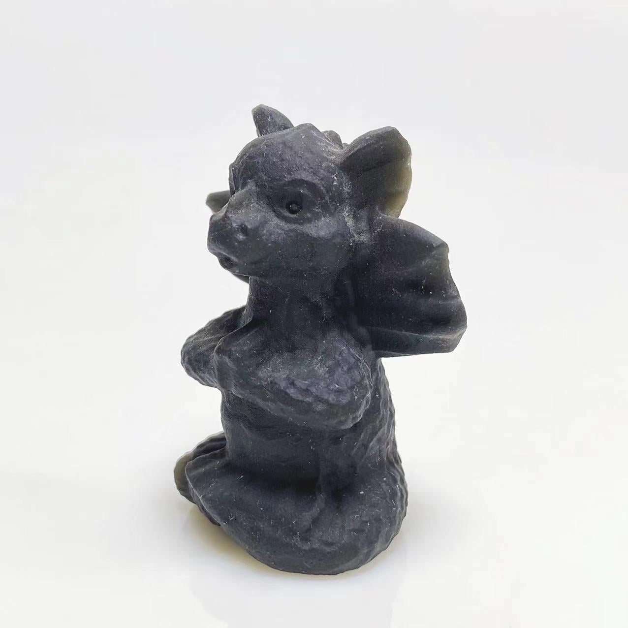 Black obsidian flying dragon baby carving