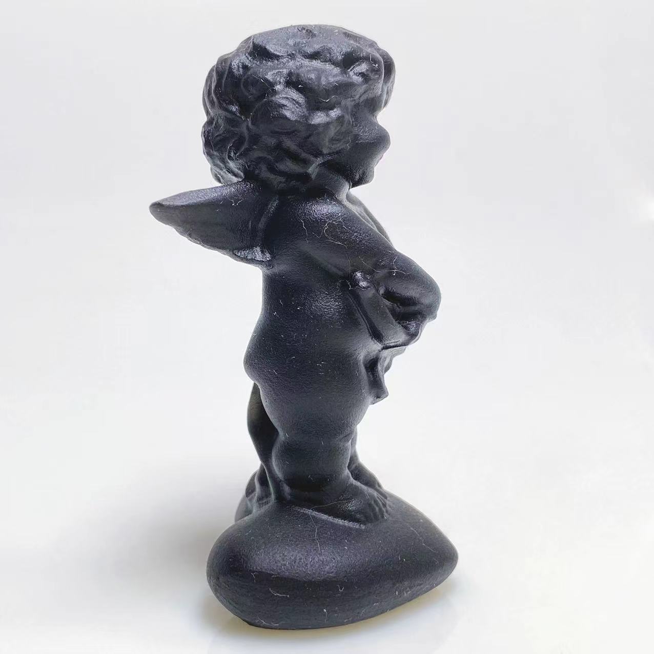 Black obsidian angel carving 2