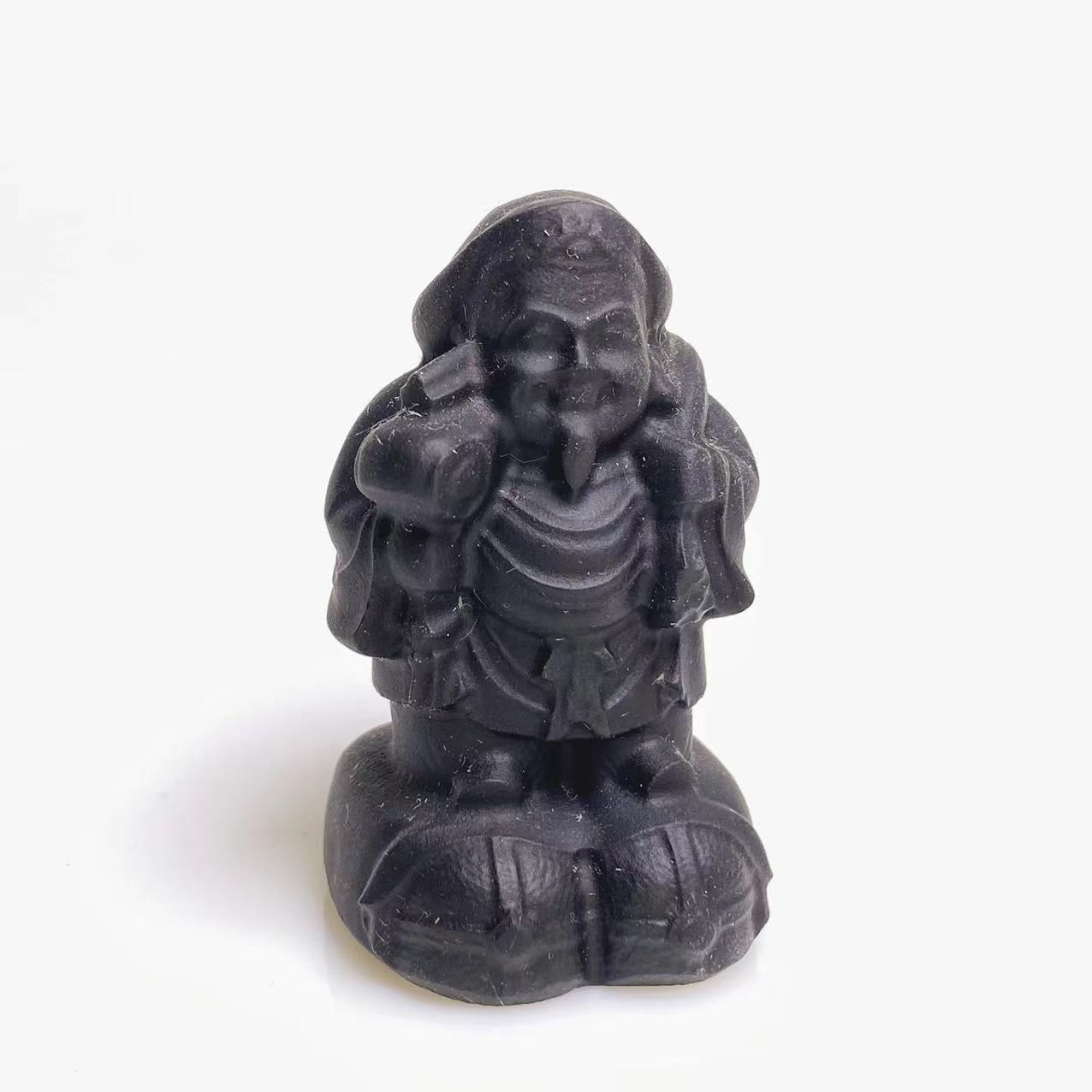 Black obsidian carving