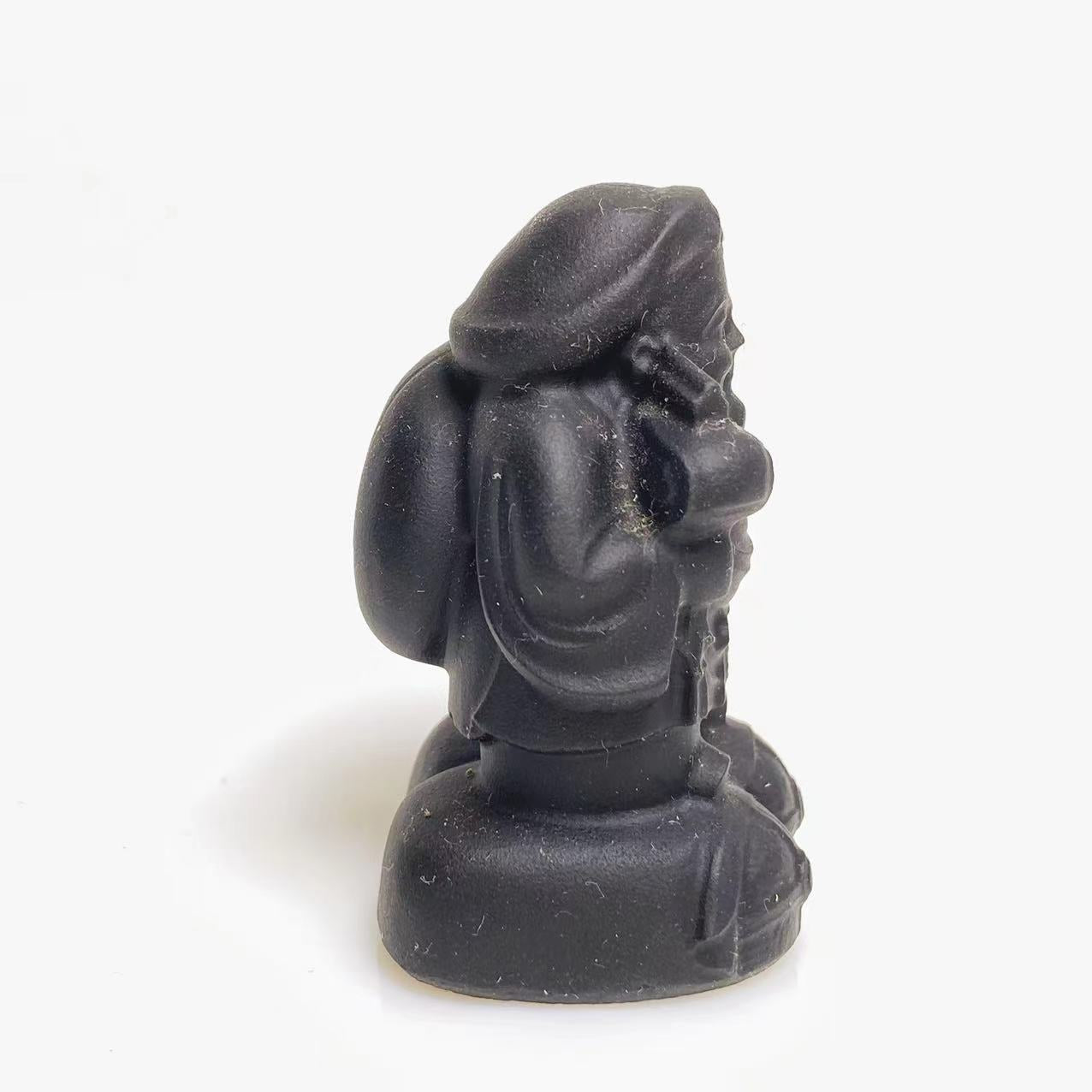 Black obsidian carving