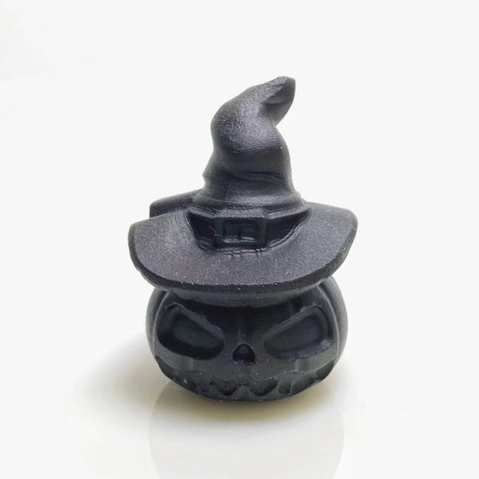 Black obsidian pumpkin with's hat carving