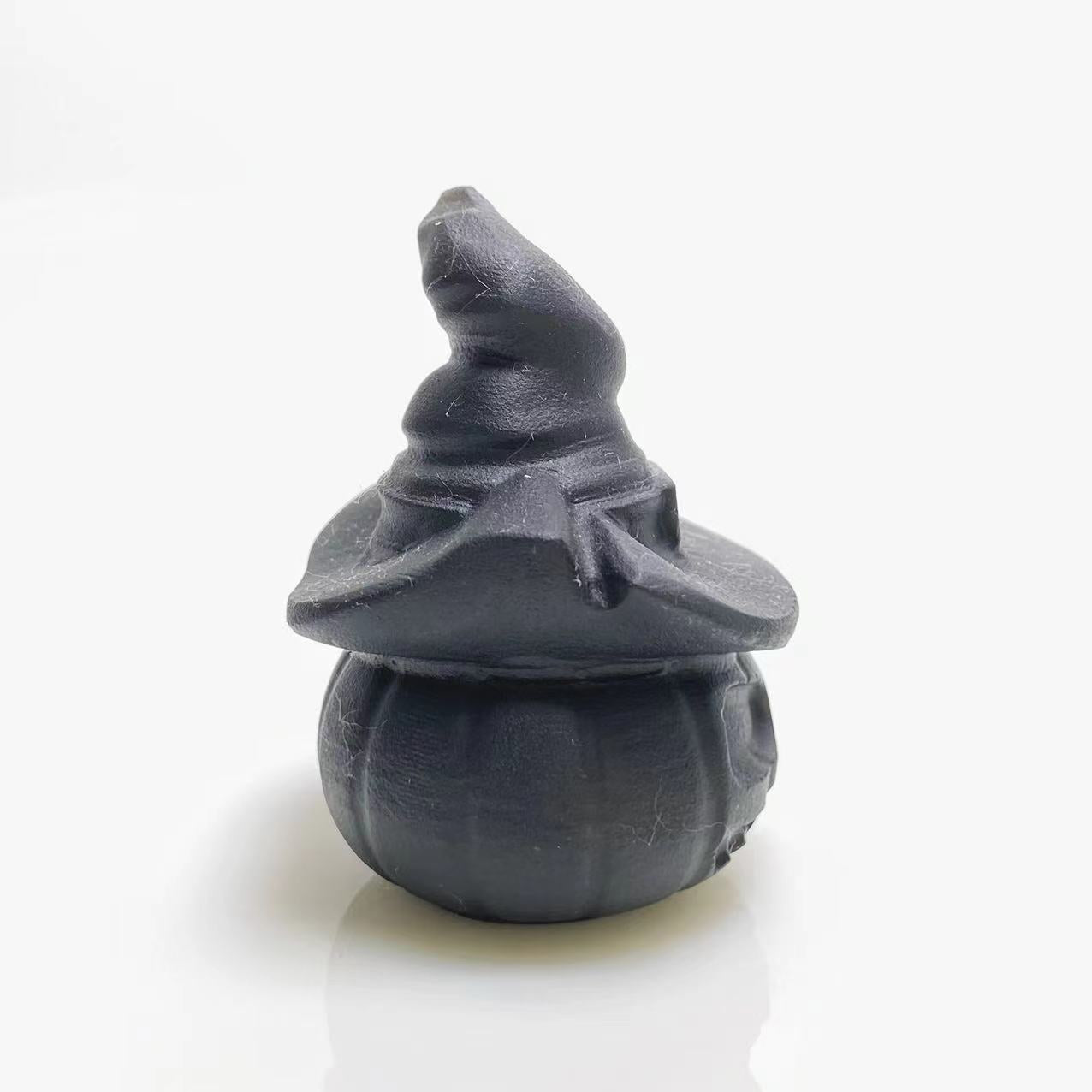 Black obsidian pumpkin with's hat carving