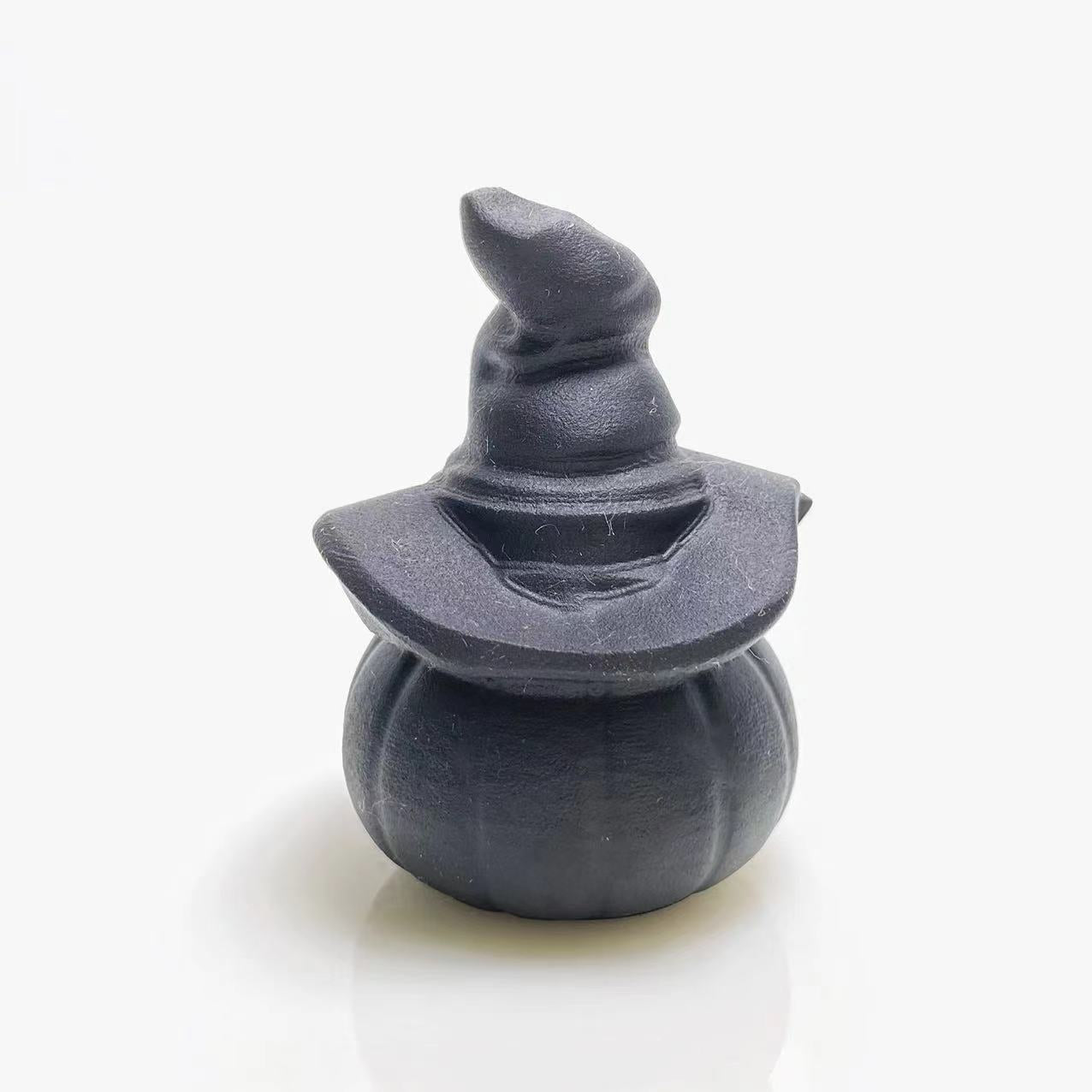 Black obsidian pumpkin with's hat carving