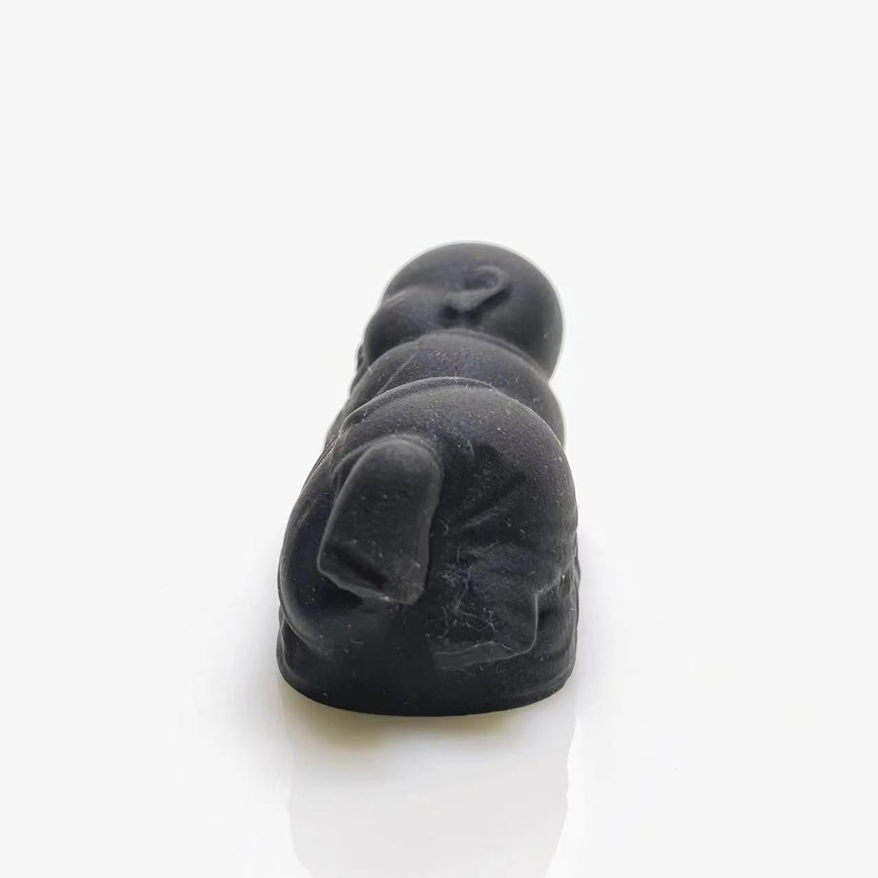 Black obsidian sleeping buddha carving