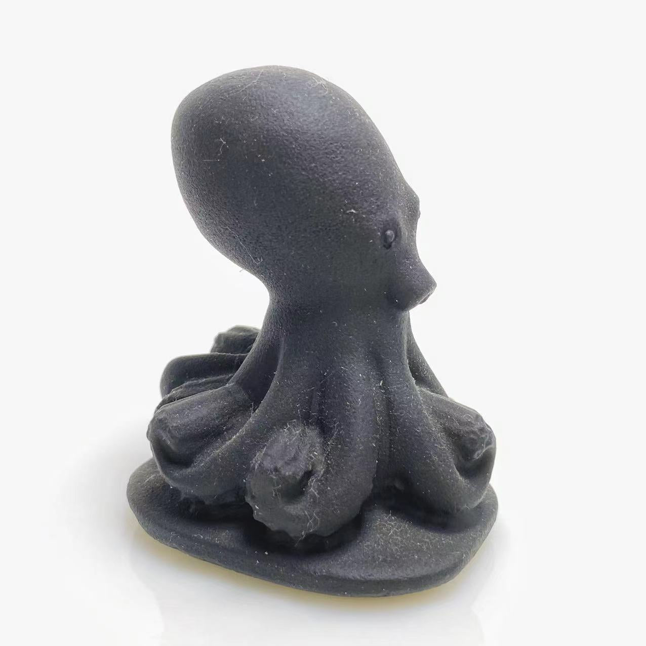 Black obsidian octopus carving