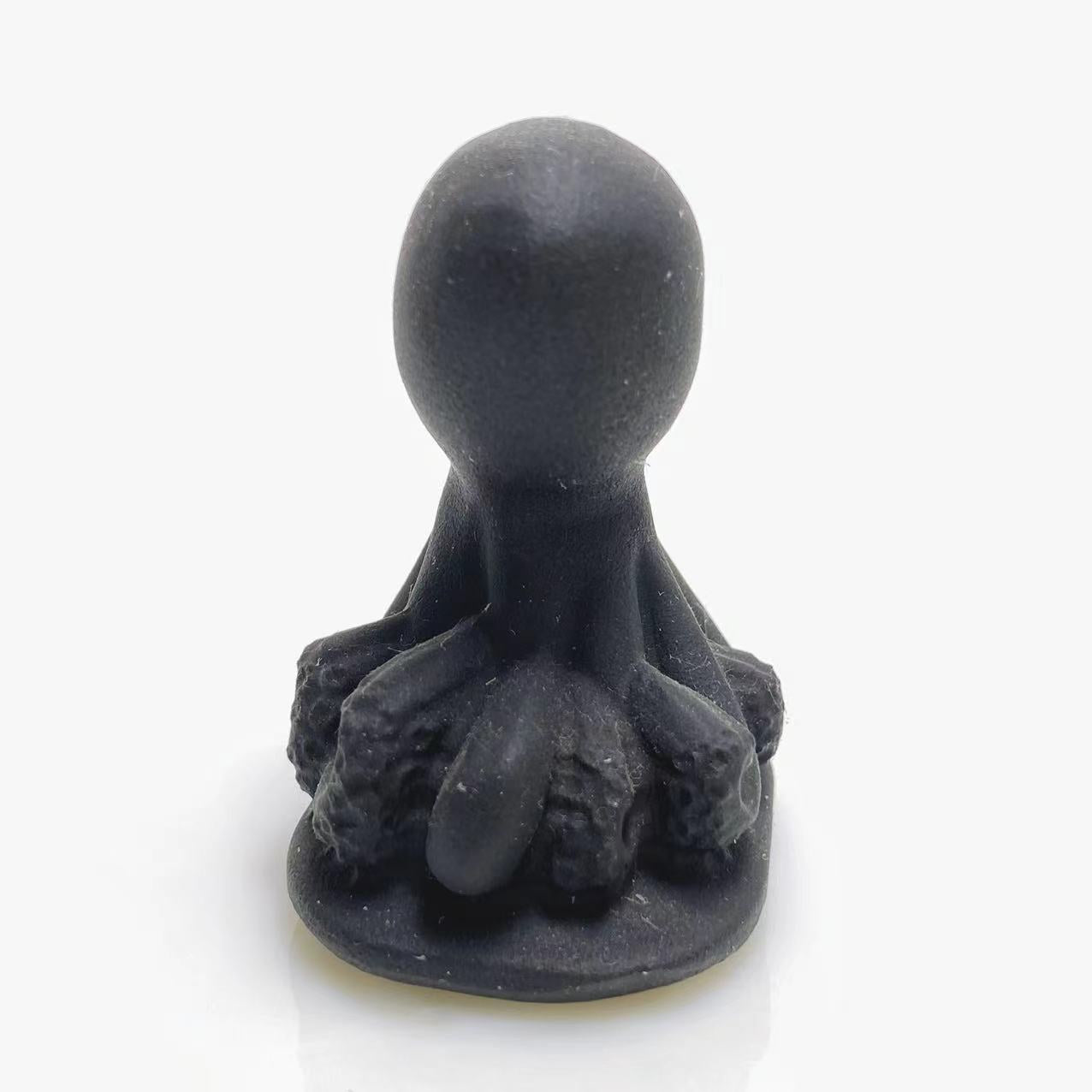 Black obsidian octopus carving