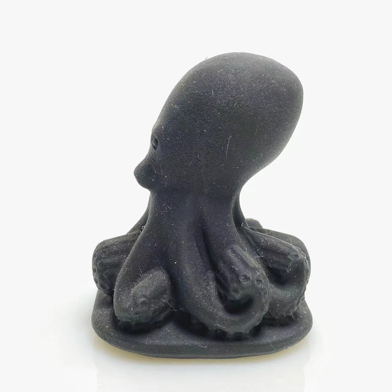 Black obsidian octopus carving