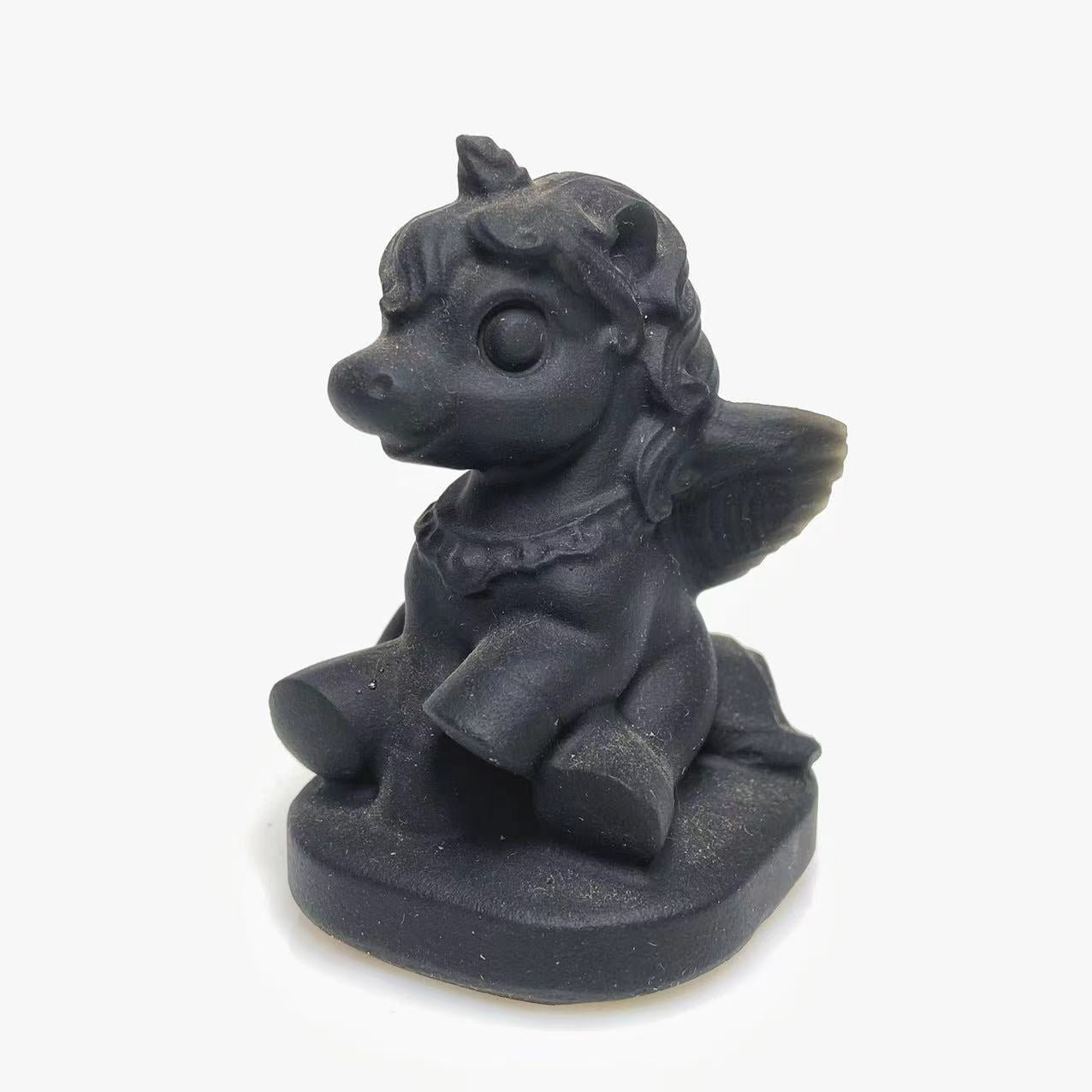 Black obsidian unicorn carving
