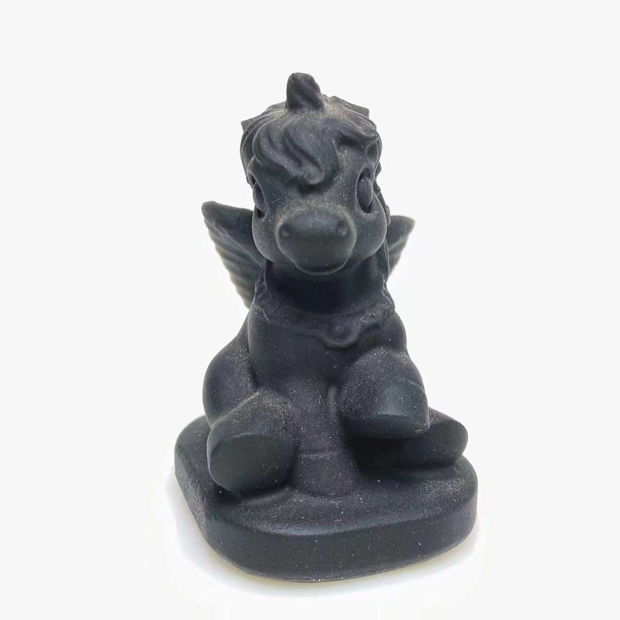 Black obsidian unicorn carving