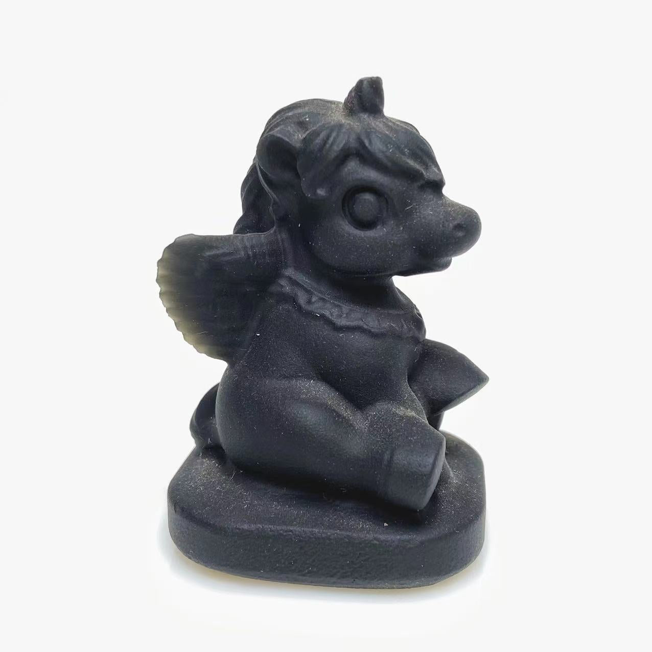 Black obsidian unicorn carving
