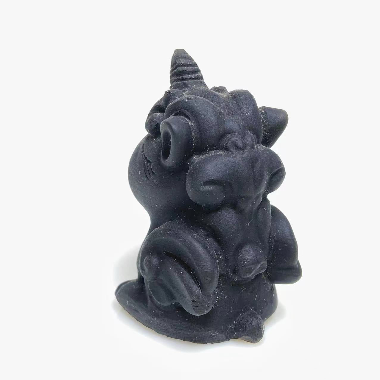 Black obsidian unicorn baby carving