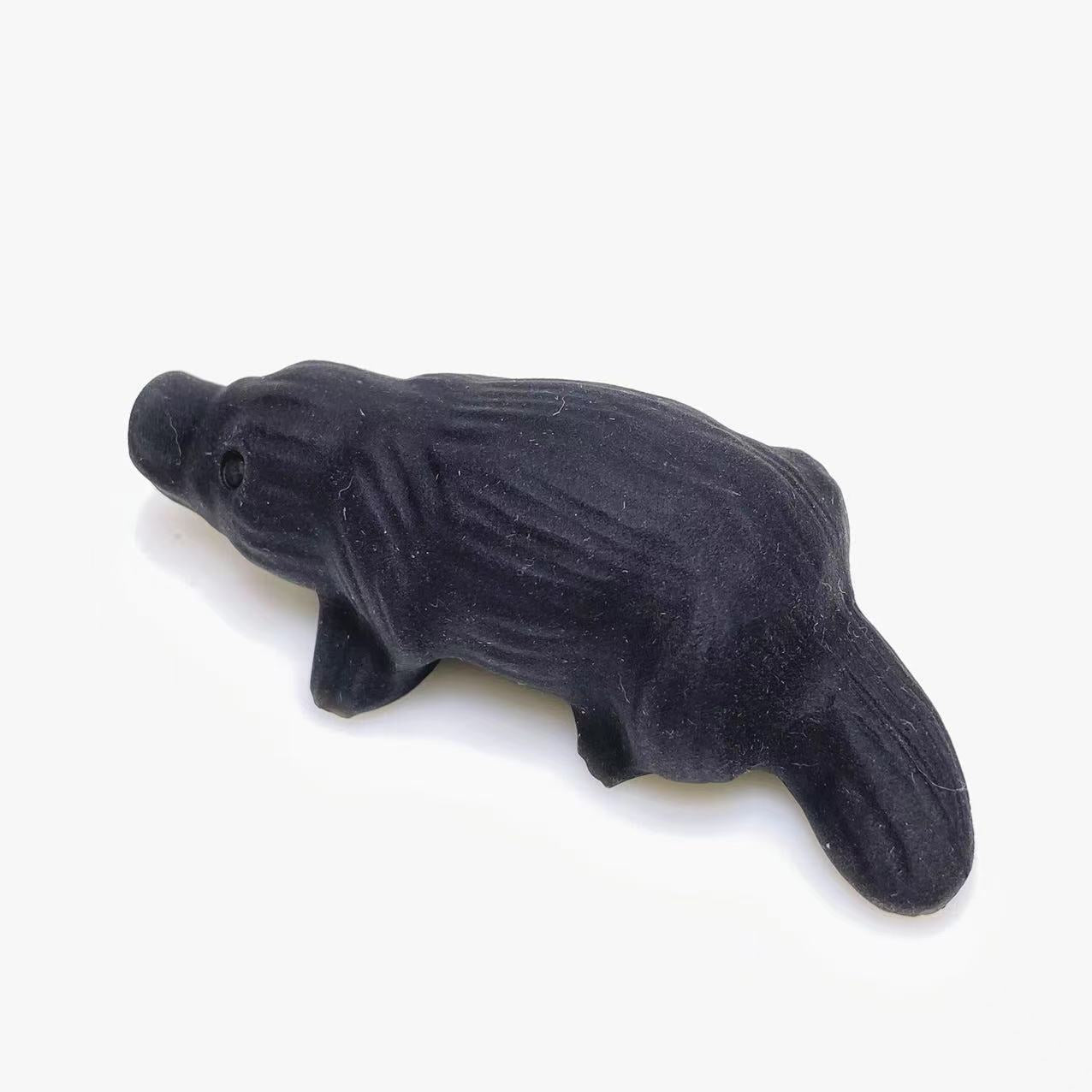 Black obsidian paltypus carving